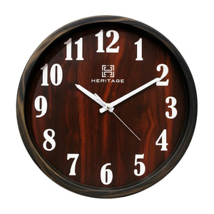 Wooden wall clock with white numbers and Heritage brand logo on a white background