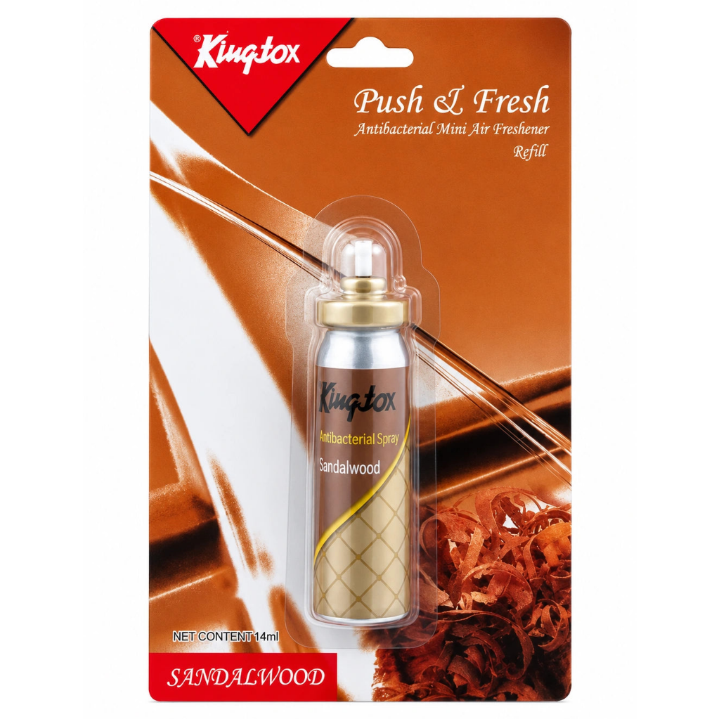 Kuangbox Push & Fresh Antiseptic Mini Air Freshener refill in Sandalwood scent, packaged in a brown cardboard blister pack with a small metallic spray can visible inside.